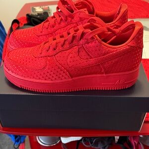 Nike Men’s bright red Nike.